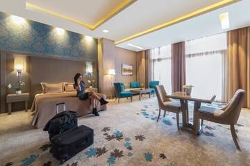 Фото номера Семейный люкс Отель Qafqaz Tufandag Mountain Resort Hotel г. Габала 3