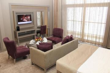 Фото номера Улучшенный двухместный номер с 1 кроватью Отель Qafqaz Tufandag Mountain Resort Hotel г. Габала 6