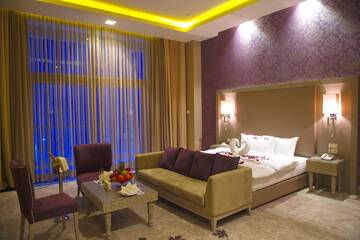 Фото номера Номер Делюкс Отель Qafqaz Tufandag Mountain Resort Hotel г. Габала 9