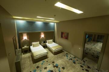 Фото номера Семейный люкс Отель Qafqaz Tufandag Mountain Resort Hotel г. Габала 5