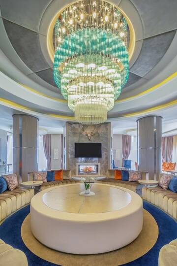 Фото номера Королевский люкс Отель Qafqaz Tufandag Mountain Resort Hotel г. Габала 2